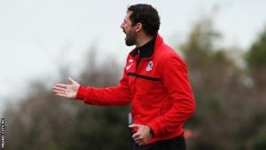 Giving his players some vital instructions as Truro assistant.
